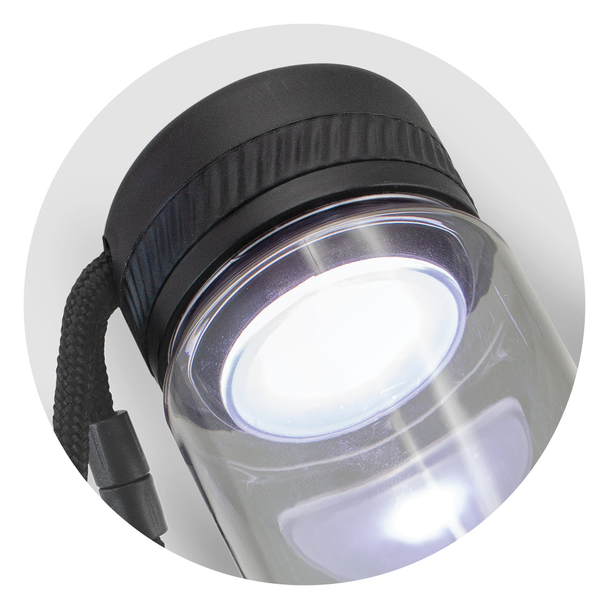 Black Lumino COB Light Bottle, 700ml, featuring Tritan material, dual light modes, and rechargeable USB for outdoor adventures.
