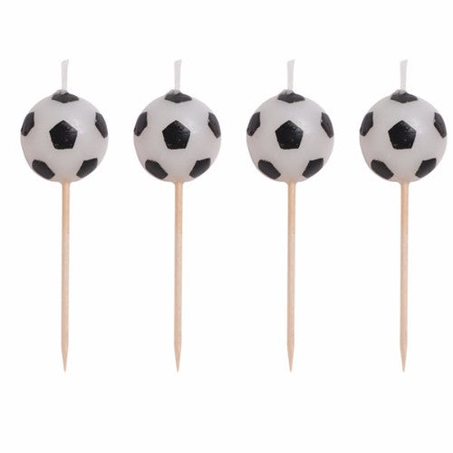 Pack of 4 vibrant soccer ball-shaped candles, perfect for parties and celebrating soccer enthusiasts.