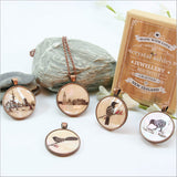 Elegant Circle Pendant Necklace featuring a Filigree Tui design on mother of pearl, with a 75cm adjustable chain.