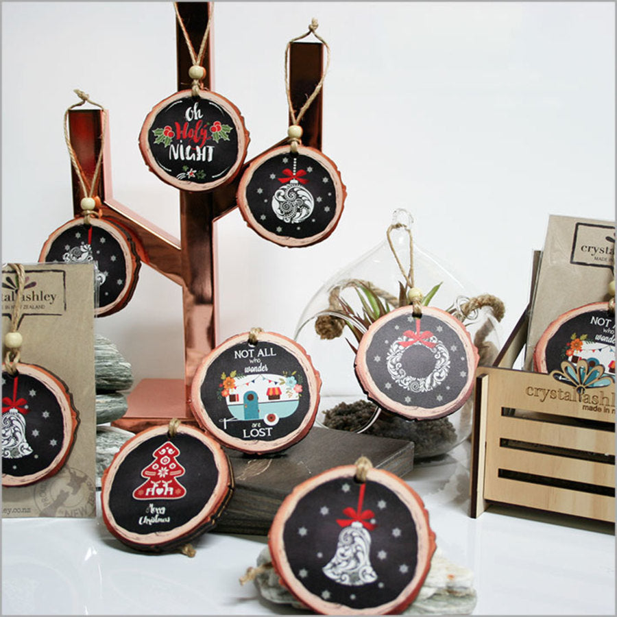 Wood slice ornament with "Oh Holy Night" design, perfect for Christmas decor. Made from sustainable wood, 80mm x 75mm size.