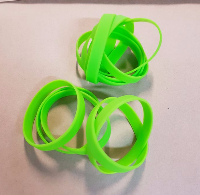 Vibrant lime green silicone wristbands in a pack of 10, perfect for events, promotions, and fundraising.