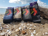 Warm and comfortable 100% wool double-layer socks, ideal for extreme conditions and available in assorted colors.