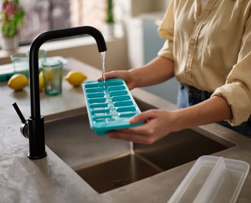 Joseph Joseph Flow Easy-fill Ice-cube Tray with stackable lid, creates 14 large ice cubes without spills or freezer odours.