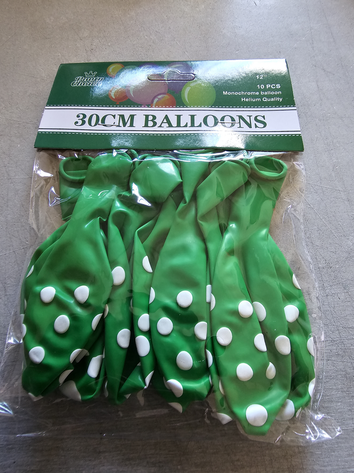 Premium 30cm pink balloons with polka dots, ideal for air or helium, sold in a pack of 10.
