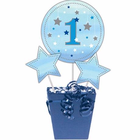 Three vibrant star-shaped centerpiece sticks for a boy's 1st birthday celebration, adding a whimsical touch to party decor.