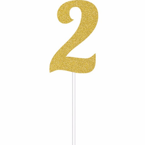 Gold glitter number 2 cake topper for second birthday, measuring 15cm x 5cm, adds sparkle to celebrations.