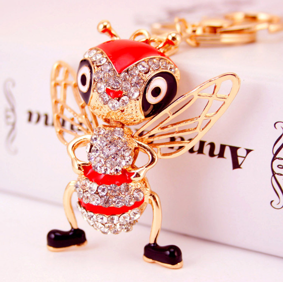 Sparkling bee-shaped key ring adorned with diamante stones, perfect for organizing keys and adding a whimsical touch.