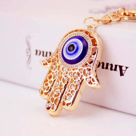 Diamante key ring featuring an Evil Eye design, shimmering with diamantes and symbolizing protection and good fortune.