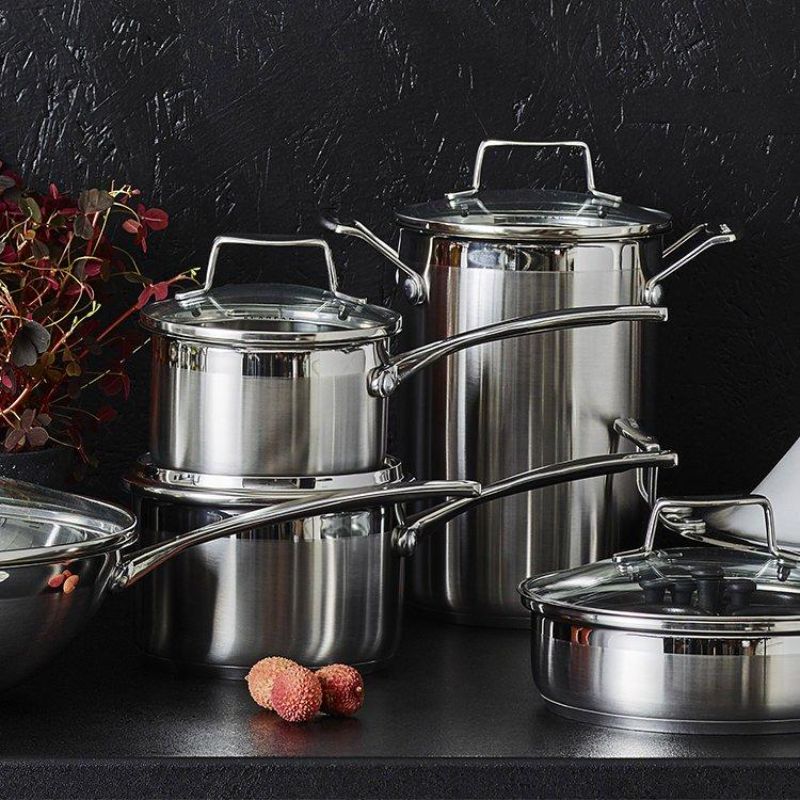 Scanpan Impact Saucepan Set featuring a 16cm and 20cm polished stainless steel design, perfect for versatile cooking.