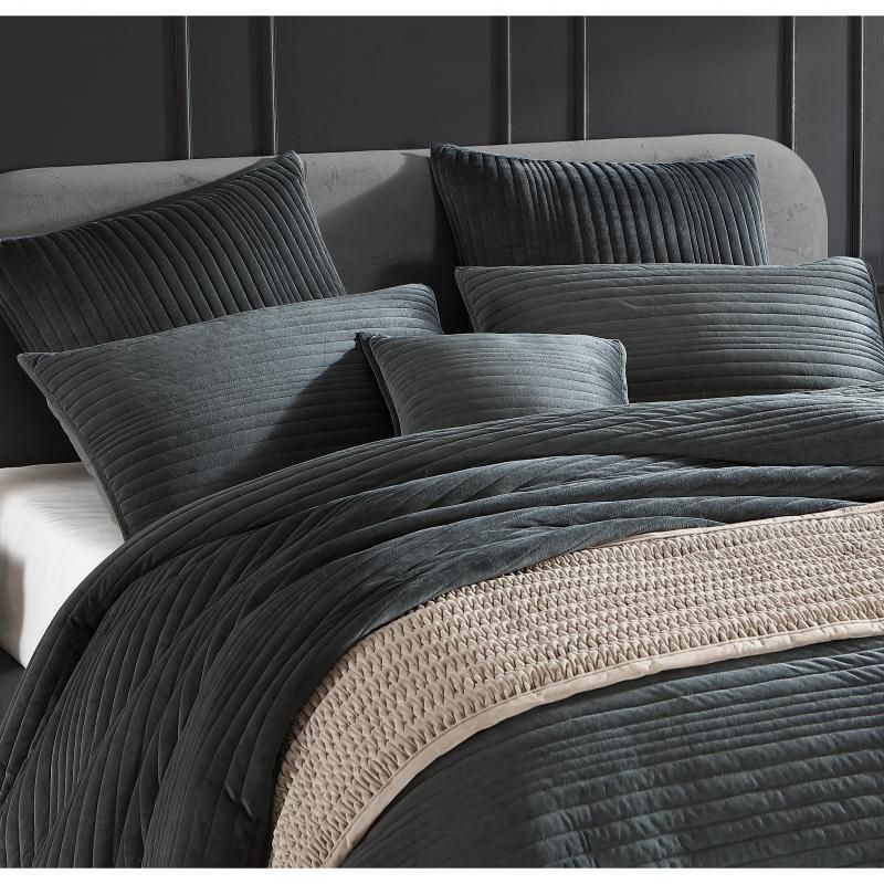 Luxurious slate quilt and pillowcase set for King beds, featuring soft velvet, decorative stitching, and a minimalist design.