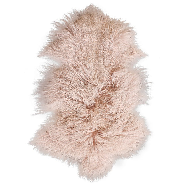 Soft blush pink Meru Tibetan Lamb Skin fur rug, 65x90cm, perfect for adding warmth and elegance to any decor.