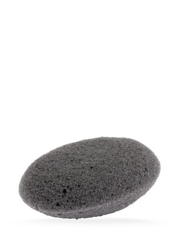 Manicare Charcoal Detox Exfoliating Sponge for gentle cleansing and exfoliation, infused with bamboo charcoal for a radiant complexion.