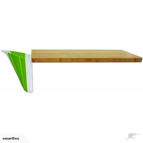 Bamboo cutting board with collapsible food collector for easy prep, transfer, and compact storage; dishwasher safe collector.