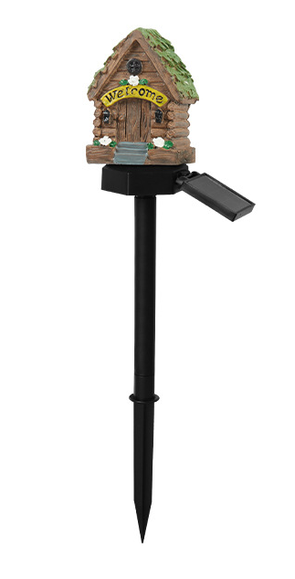 Whimsical fairy house solar stake light designed to illuminate gardens with eco-friendly, warm glow at dusk.