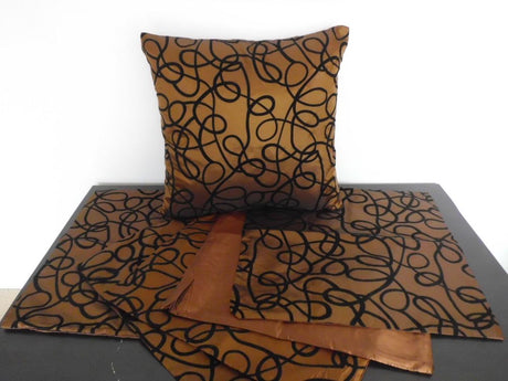 Set of 5 stylish brown cushion covers with textured black squiggle design, reversible for versatility and easy zip closure.
