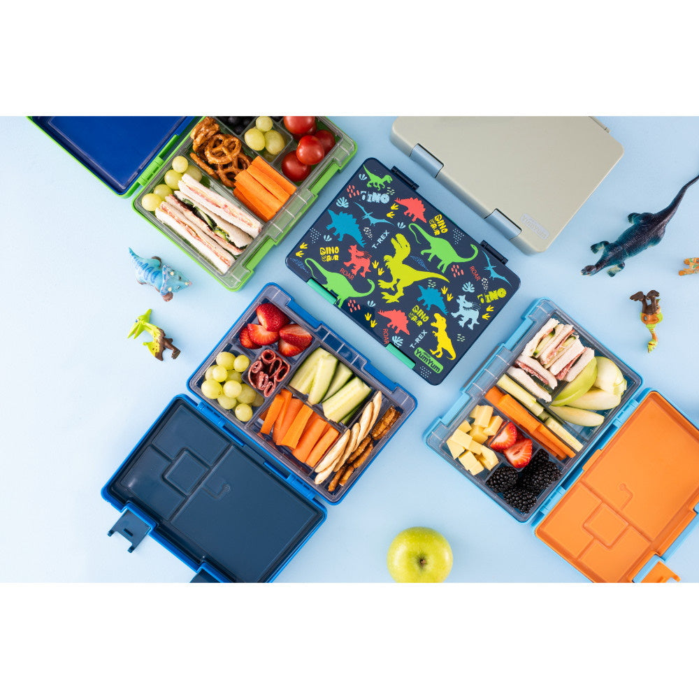 Avanti Yum Yum Bento Box featuring a fun dinosaur parade design with multiple leak-proof compartments for healthy meals.