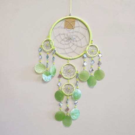 Dream Catcher Mirror Shell Chimes in vibrant lime, featuring intricate designs and soothing sounds for serene home decor.