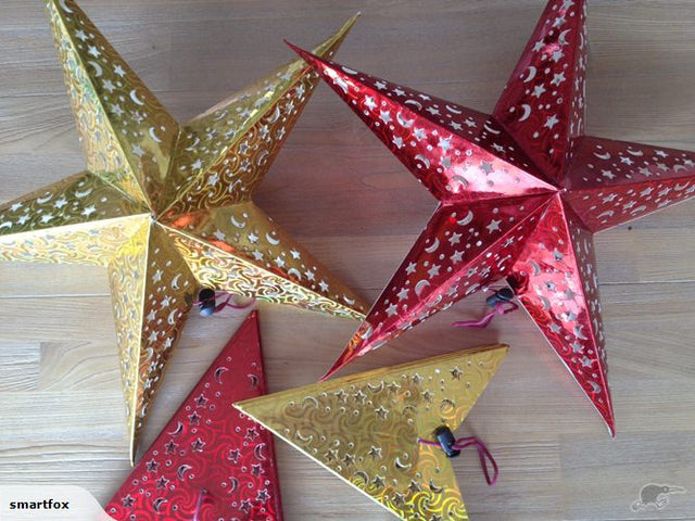 Three red star lanterns, 45cm, beautifully crafted to create enchanting patterns when illuminated; perfect for decor and celebrations.