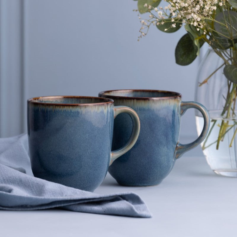 Set of 4 Mason Cash reactive blue mugs, 400ml each, unique glazed design, durable stoneware, dishwasher safe.