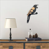 Wall art featuring a two-tone Tui bird design, made from durable aluminium composite for indoor/outdoor use.