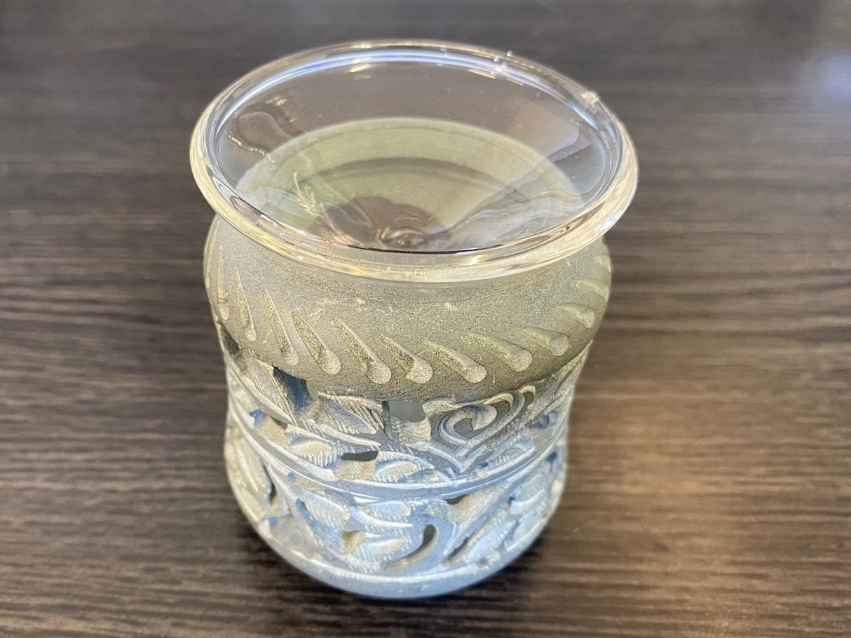 Soapstone Aroma Therapy Oil Burner with fine carvings, perfect for enhancing ambiance and enjoying aromatherapy.
