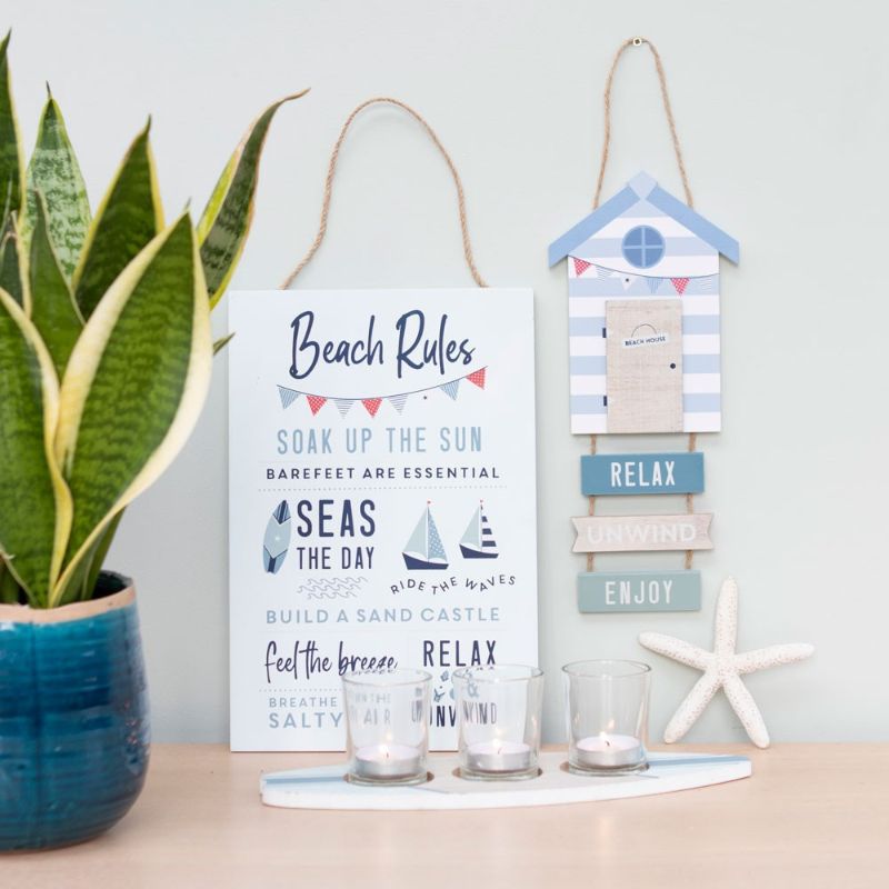 Vibrant MDF beach rules sign featuring surfboard and sailboat designs to enhance coastal decor and inspire relaxation.