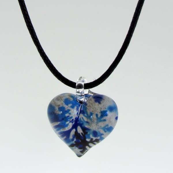 Hand-crafted blue heart-shaped art glass pendant on adjustable cord necklace, showcasing Thai artisan craftsmanship.