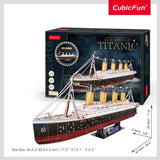 3D Puzzle of RMS Titanic XL with LED lights, measuring 87.9 x 9.6 x 29.4 cm, crafted from 266 interlocking pieces.