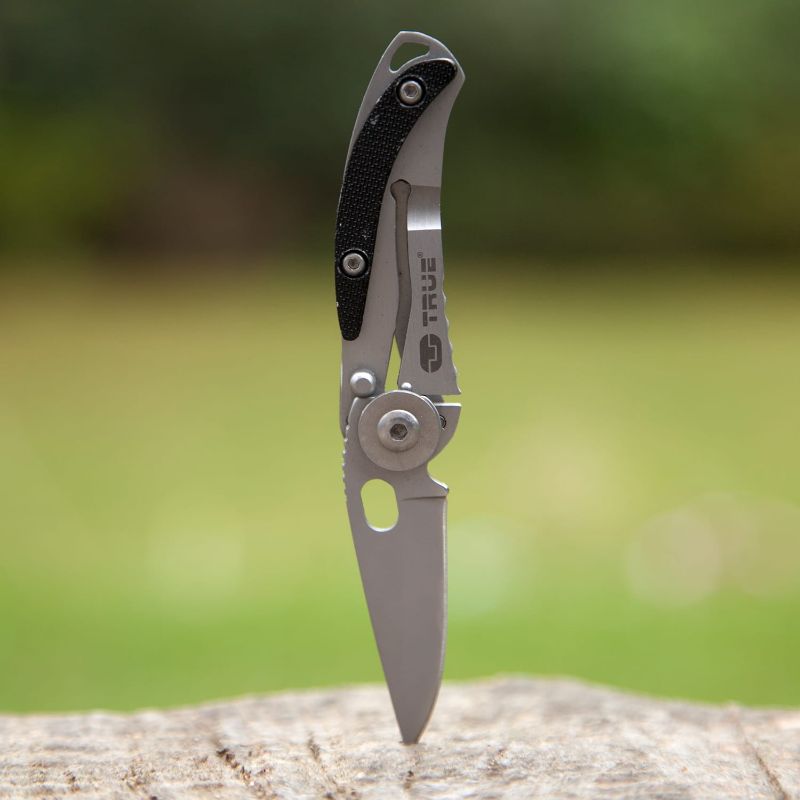 Lightweight silver and black folding knife with a skeletal design for easy one-handed operation, ideal for everyday use.