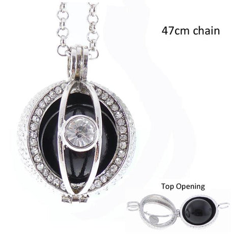 Elegant Angel Caller Necklace with a cocoon locket, rhodium-plated chain, and brass ball bell for spiritual protection.