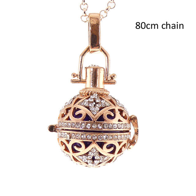 Rose gold plated angel caller necklace with diamante locket, 80cm adjustable chain, and enchanting chiming sound.