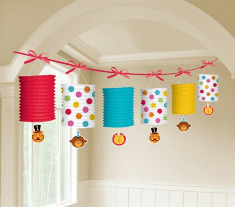 Colorful lantern garland for a Fisher Price 1st birthday circus theme, perfect for festive indoor or outdoor celebrations.