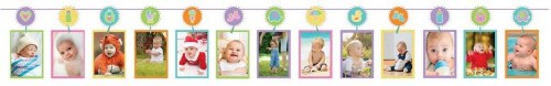 Interactive baby shower game featuring a decorative photo line with pegs for displaying photos and messages.