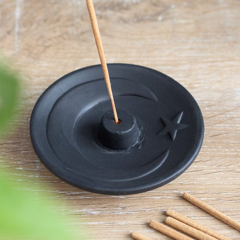 Black crescent moon terracotta incense plate, perfect for spiritual spaces, eco-friendly decor, and enhancing tranquility.