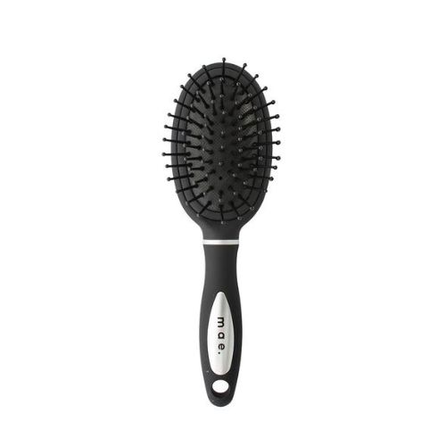 Small oval pad brush by Mae., perfect for detangling all hair types and promoting scalp health. Ideal for travel.