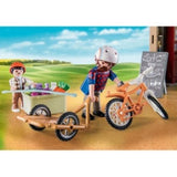 Playmobil Country Farm Shop set with figures, milk vending machine, and fresh produce for imaginative farming play.