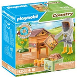 Playmobil Beekeeper set featuring a caretaker with bees, beehive, and smoker, promoting fun and educational play about beekeeping.