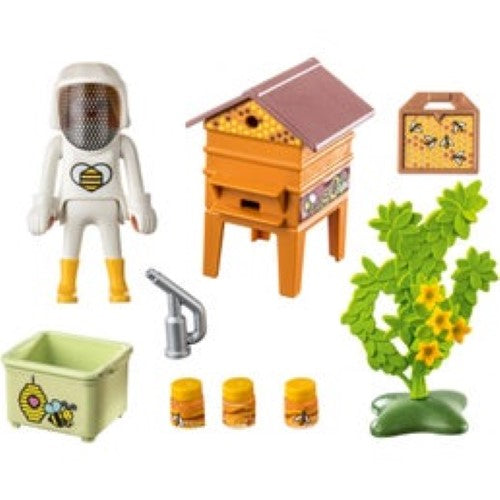 Playmobil Beekeeper set featuring a caring beekeeper, bees, beehive, and smoker for educational play about beekeeping.