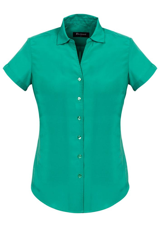 Solanda Dynasty Green short sleeve shirt for women, featuring soft-touch polyester, open neck design, and stylish pleats.