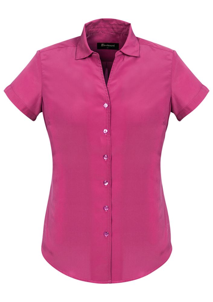 Solanda Ladies Short Sleeve Shirt in vibrant Melon, featuring a semi-fitted design and soft-touch polyester for ultimate comfort.