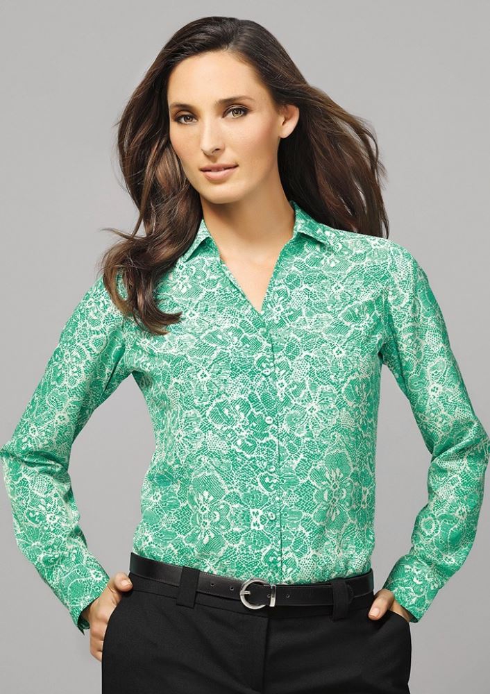 Solanda Ladies Print Long Sleeve Shirt in vibrant melon, featuring soft touch polyester and stylish pleats for comfort and elegance.