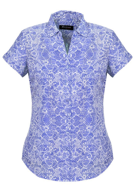 Patriot Blue short sleeve shirt for women, featuring a semi-fitted design, soft polyester fabric, and stylish pleat details.