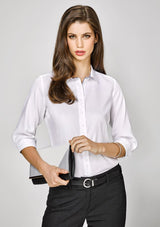 Herne Bay Ladies 3/4 Sleeve Shirt in White/Purple Reign, featuring unique trim details and a comfortable cotton blend fabric.