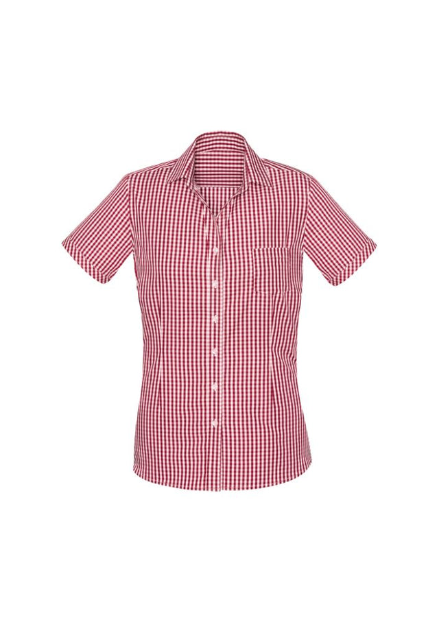 Springfield Ladies Short Sleeve Shirt in Cardinal featuring a check design, open neck, and front pocket for versatile styling.