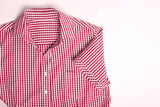 Vibrant cardinal short sleeve shirt for women, featuring a check pattern, semi-fitted silhouette, and practical front pocket.
