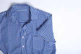 Springfield Ladies Short Sleeve Shirt in French Navy, featuring a semi-fitted style, open neck, and bold check pattern.