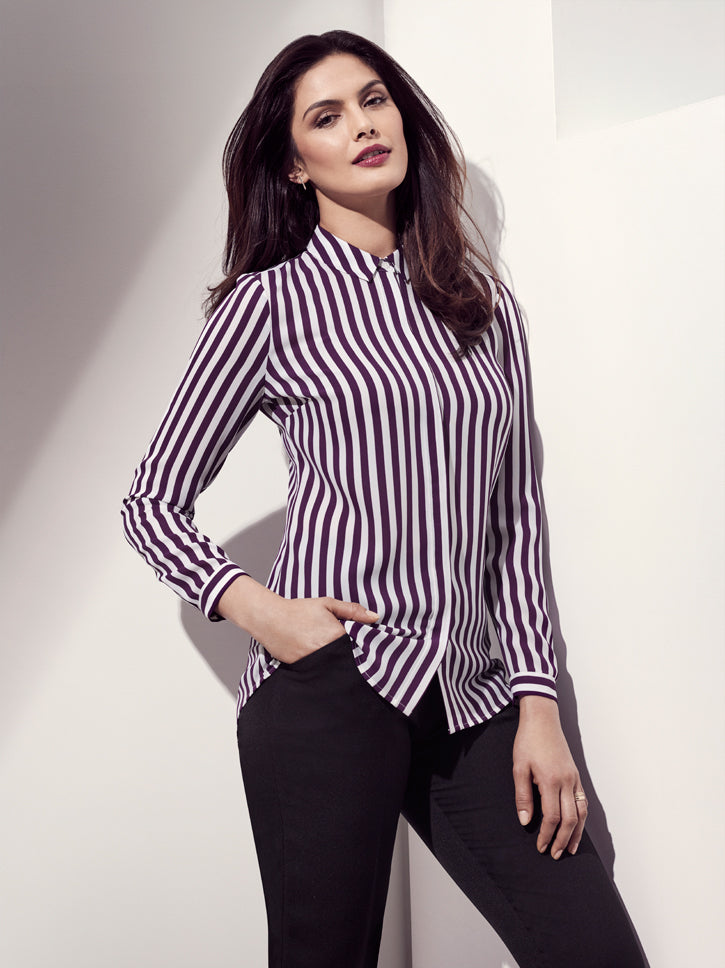 Ladies long sleeve shirt in Purple Reign, featuring a concealed button placket and inverted back pleat for a chic, semi-fitted look.