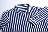 Navy long sleeve shirt for women, featuring a luxe touch, semi-fitted silhouette, and inverted back pleat for a polished look.