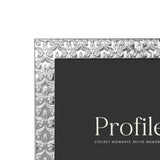 Renaissance-inspired silver metal photo frame, 8x10in, with embossed details and versatile display options.