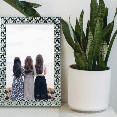 Elegant 8x10in silver metal photo frame with intricate Renaissance design, perfect for showcasing cherished memories.